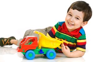 little boy with toy car